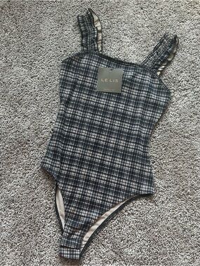 Le Lis Black and White Plaid Ruffle Strap Bodysuit